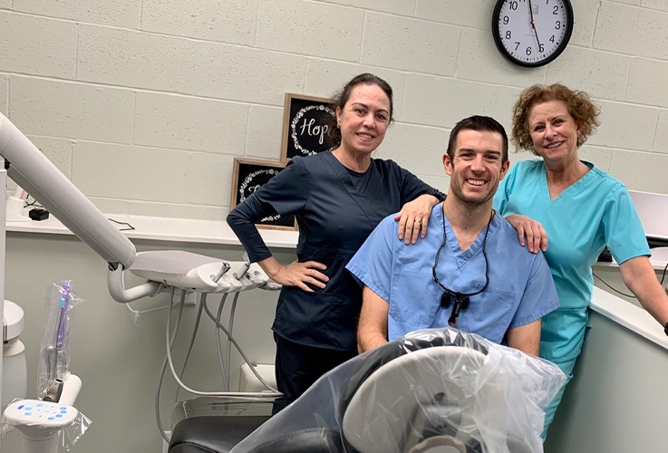 Dr. Springhetti and two of his dental team members