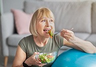 Woman eating a salad