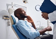Man smiling at the dentist