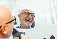 You can help your mouth adjust to your new dentures by wearing them frequently and sticking to a soft diet