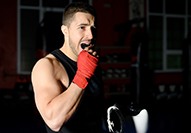 Carmel patient wearing mouthguard while playing sports 