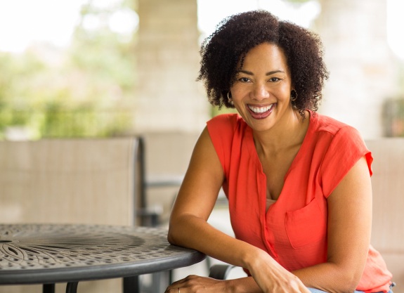 Woman sharing flawless smile