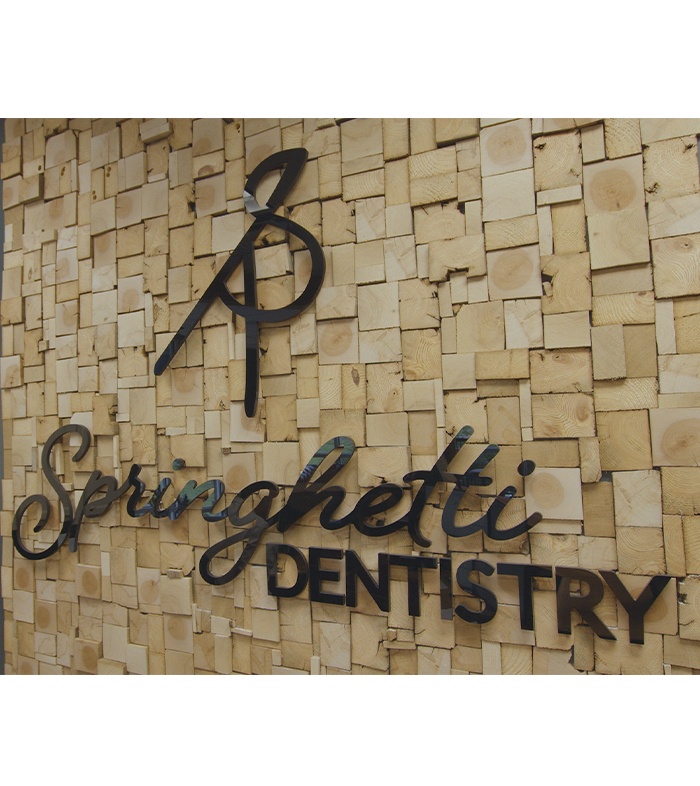 Springhetti Dentistry sign on exterior of Carmel dental office