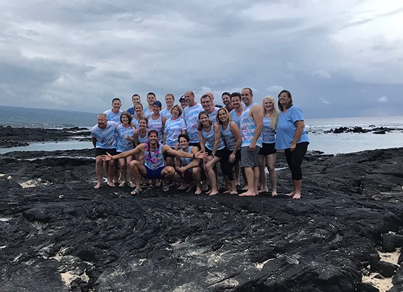 Large group of people by the ocean