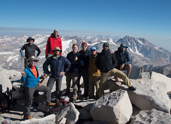 Dr. Springhetti with family and friends on a mountain