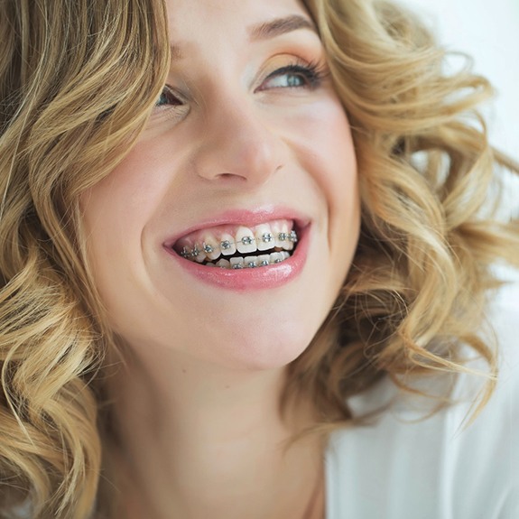 Woman with orthodontics in Carmel