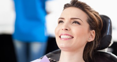 Smiling woman in dental chair