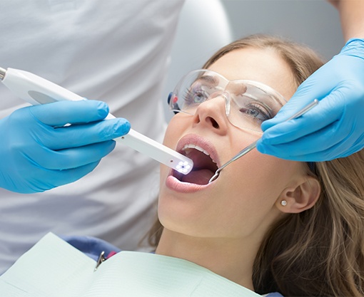 Dentist capturing intraoral images