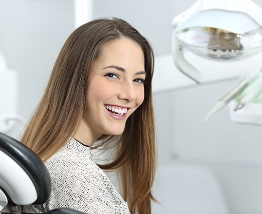 Woman with veneers in Carmel smiling