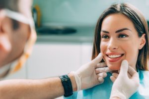 woman receiving cosmetic dental treatment