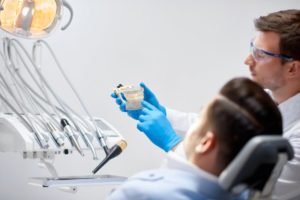 man talking to his dentist 