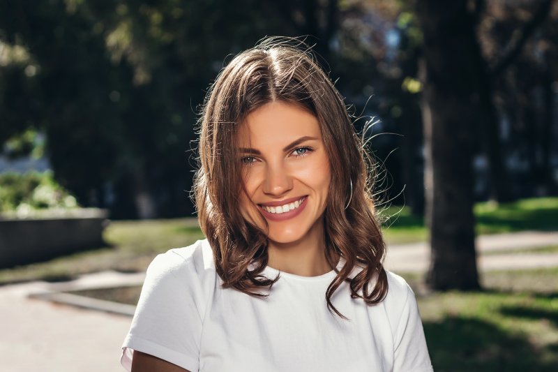 Smiling woman showing her good oral health in Carmel