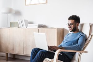 man looking at computer 