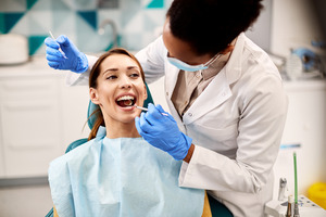 Dentist talking to a patient